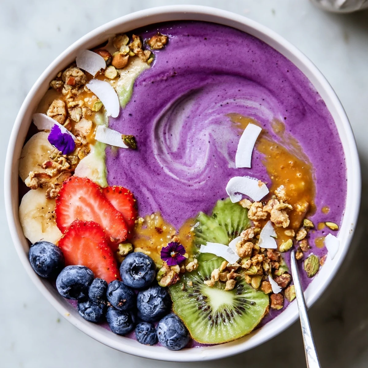 Colorful breakfast smoothie bowls featuring unique flavors and crunchy toppings invite delight.
