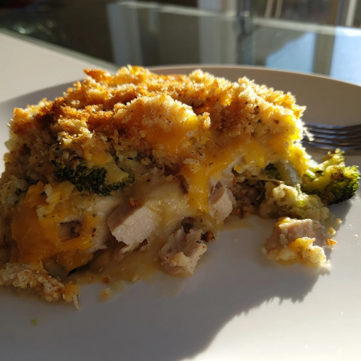 Savory Chicken & Broccoli Cheddar Bake, a comforting casserole with rich flavors and textures.