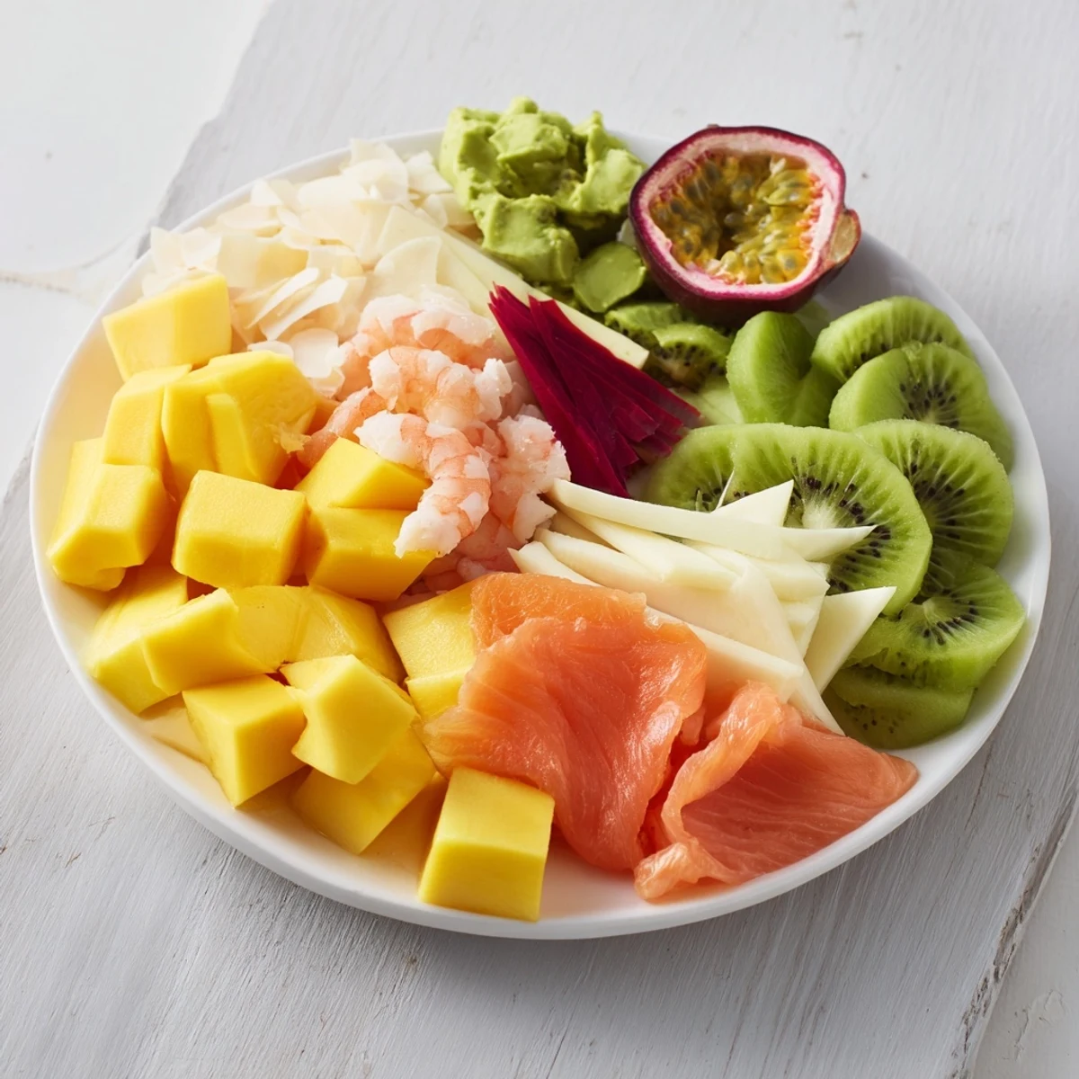 Tropical Wave Tasting Platter: a colorful display of shrimp, fruits, and sauces, perfect for sharing.