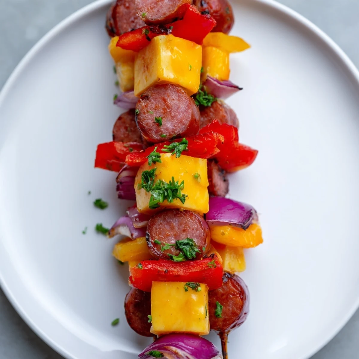 Smoky grilled Savory Skewers: Chimney Stack Sausage and Cheese, bursting with vibrant vegetables and cheese.