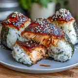 Golden-brown grilled salmon onigiri with smoky, crispy rice and a juicy, flavorful salmon filling.  