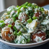 A refreshing bowl of Creamy Potato Salad Light, perfect for summer picnics.