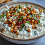 Cheesy Cottage Cheese Queso featuring smoky roasted corn, ready for party time.