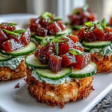 Party appetizer: Crispy rice tuna poke cups ready to be enjoyed.