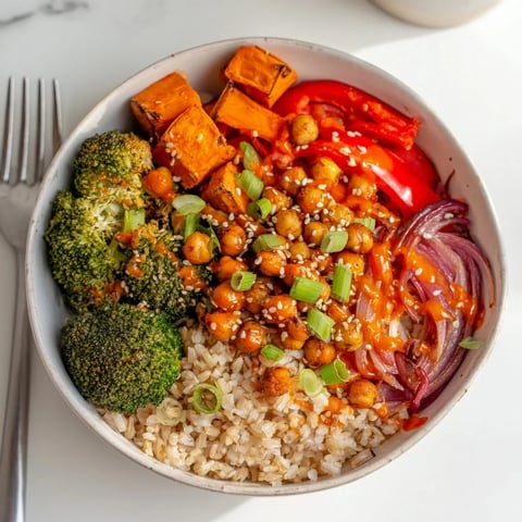Vibrant Bold Sauce Drizzle Bowls topped with roasted veggies and luscious sauces.  