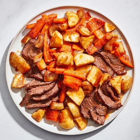 Tender Sunday pot roast with roasted veggies, a hearty meal perfect for a family dinner.