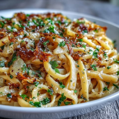 Golden caramelized cabbage and garlic tossed with al dente spaghetti, topped with freshly grated Parmesan and chopped parsley.