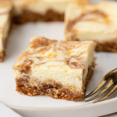Warm Spiced Sweet Tea Cheesecake Blondies offering rich flavors and a tender crumb.  