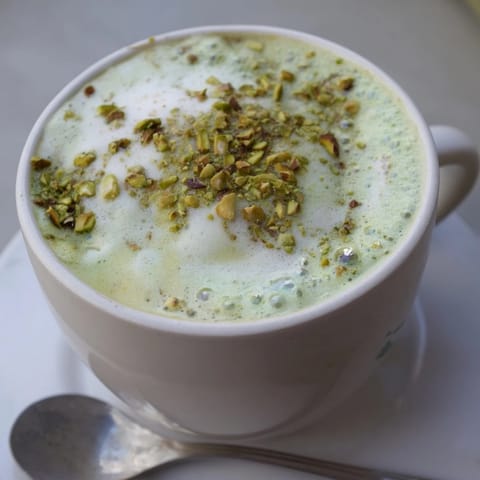 Delicious homemade pistachio milk latte, a nutty twist on your morning coffee.  